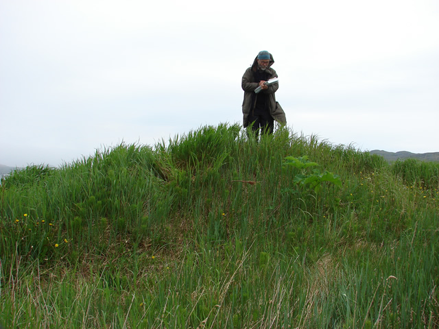 Recording a bread oven mound.